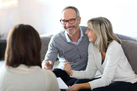 real estate agent with couple