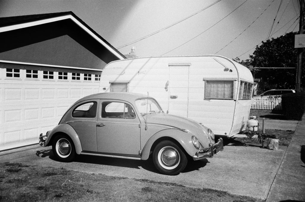 car and camper in driveway