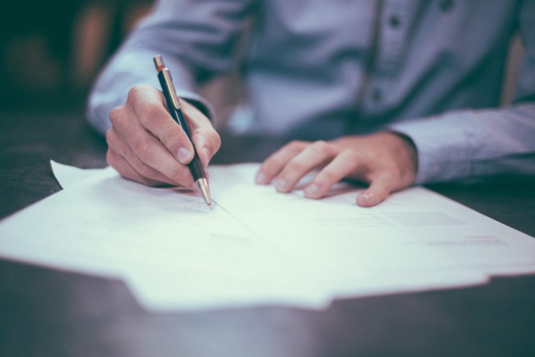 person completing paperwork